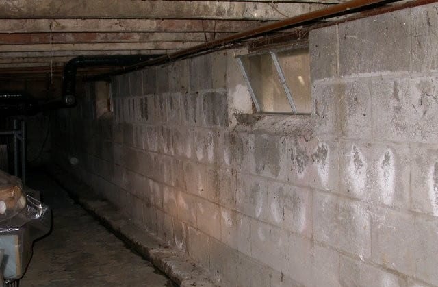 efflorescence on foundation wall